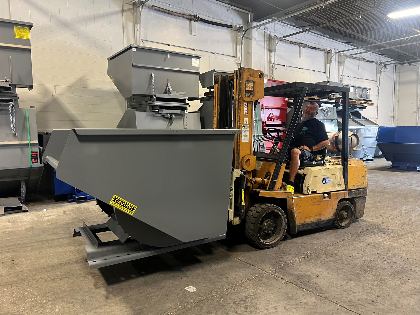 Self-Dumping Hopper on Forklift
